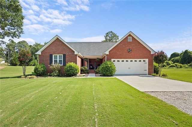 view of front of house featuring a front yard and a garage