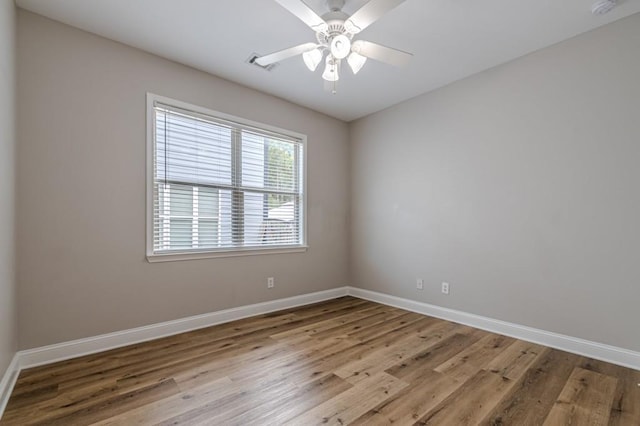 empty room featuring light hardwood / wood-style floors and ceiling fan