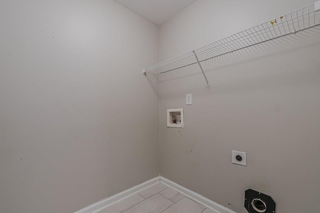 laundry area with washer hookup and electric dryer hookup