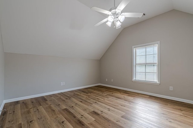 bonus room featuring light hardwood / wood-style flooring, vaulted ceiling, and ceiling fan