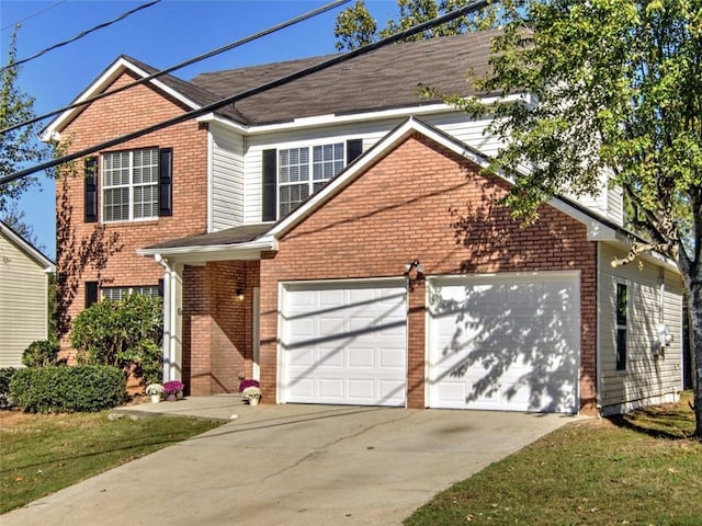 view of front property with a front yard and a garage