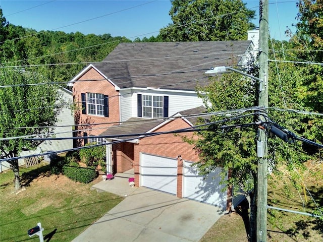 view of front of home with a garage