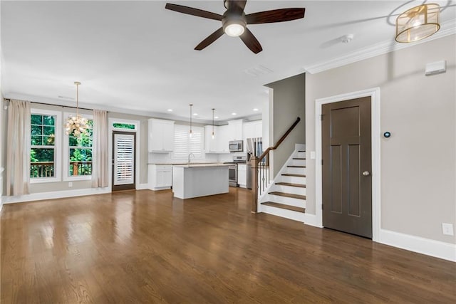 1547 Cambridge Pl, Marietta, GA 30062 - unfurnished living room with ceiling fan, baseboards, dark wood-style floors, stairs, and recessed lighting