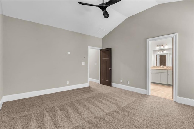 1547 Cambridge Pl, Marietta, GA 30062 - unfurnished bedroom with light carpet, lofted ceiling, baseboards, ensuite bath, and a sink
