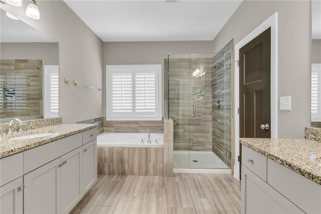 1547 Cambridge Pl, Marietta, GA 30062 - bathroom with a stall shower, two vanities, and a garden tub