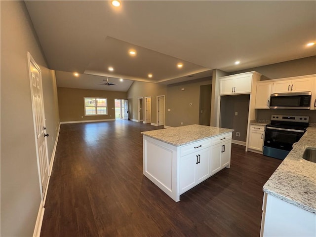 unfurnished room featuring ceiling fan, high vaulted ceiling, and dark hardwood / wood-style floors