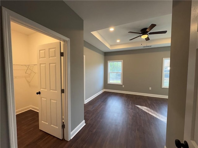 full bathroom with hardwood / wood-style flooring, vanity,  shower combination, and toilet