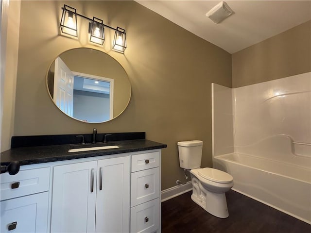 walk in closet featuring dark hardwood / wood-style flooring