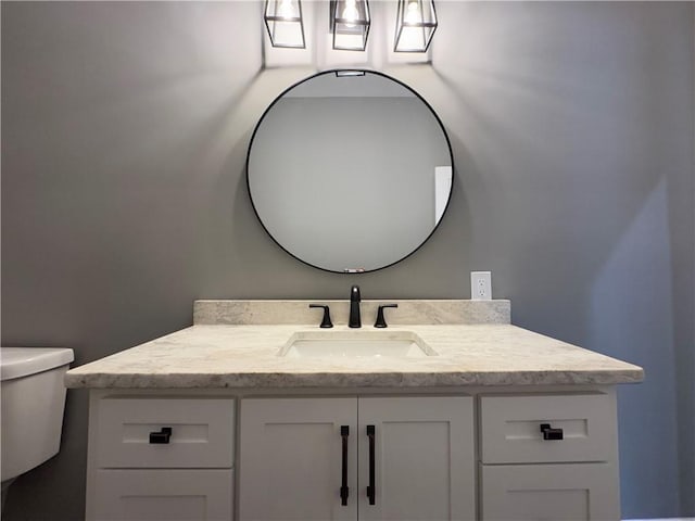 full bathroom with vanity, hardwood / wood-style flooring, toilet, and shower / bathtub combination