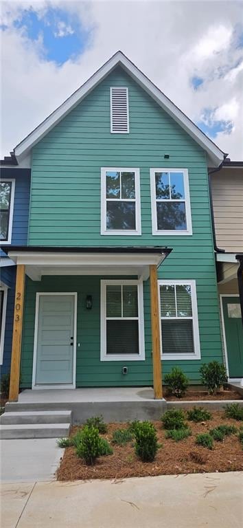 1095 Tucker Ave Unit 203, Atlanta, GA 30310 - view of front facade featuring covered porch