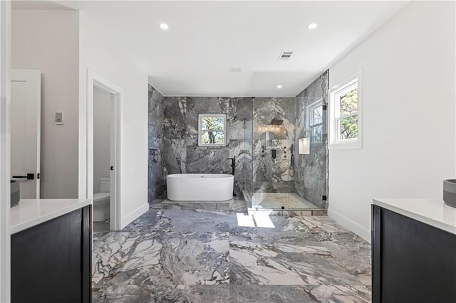 1857 Defoor Ave, Atlanta, GA 30318 - bathroom with a freestanding tub, marble finish floor, a marble finish shower, and a healthy amount of sunlight