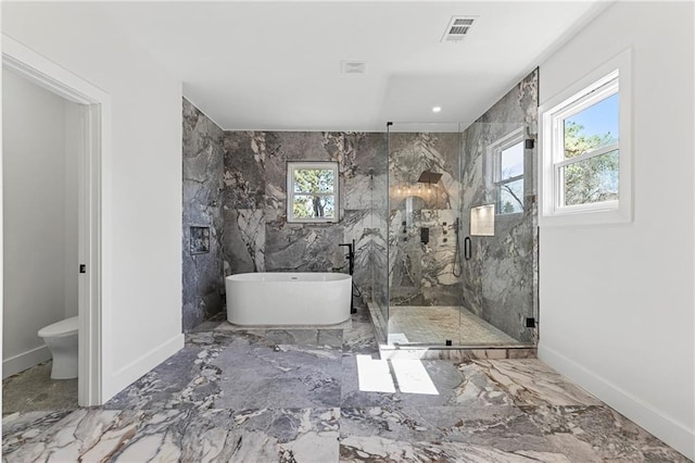 1857 Defoor Ave, Atlanta, GA 30318 - bathroom featuring visible vents, marble finish floor, a marble finish shower, and a wealth of natural light