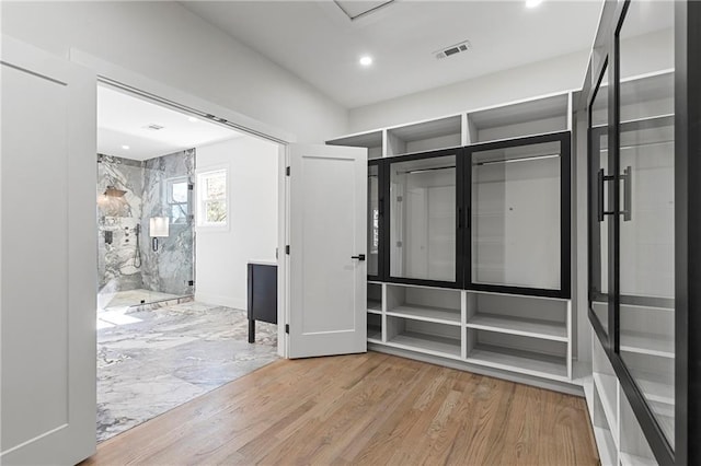 1857 Defoor Ave, Atlanta, GA 30318 - spacious closet featuring wood finished floors and visible vents