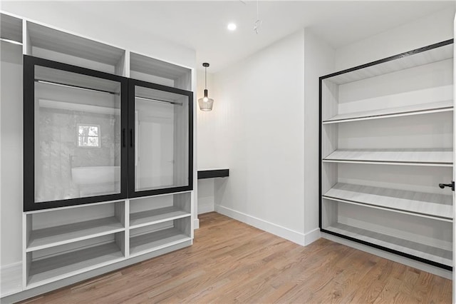 1857 Defoor Ave, Atlanta, GA 30318 - spacious closet with wood finished floors