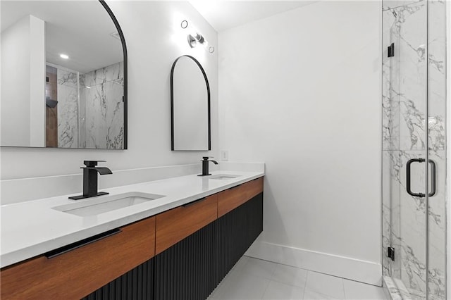 1857 Defoor Ave, Atlanta, GA 30318 - full bath featuring double vanity, a sink, a marble finish shower, and baseboards