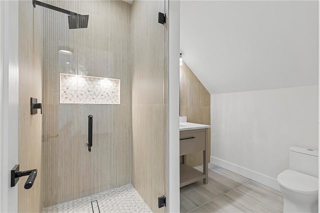 1857 Defoor Ave, Atlanta, GA 30318 - bathroom with vanity, a stall shower, toilet, and lofted ceiling