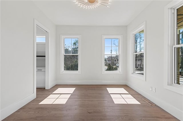 1857 Defoor Ave, Atlanta, GA 30318 - unfurnished sunroom featuring visible vents and a wealth of natural light