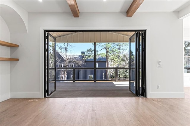1857 Defoor Ave, Atlanta, GA 30318 - interior space with baseboards, beam ceiling, and wood finished floors