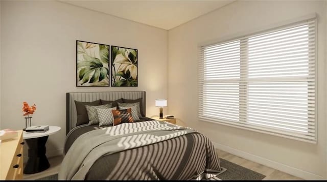 bedroom featuring multiple windows, wood finished floors, and baseboards