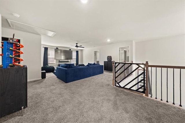 372 Garnet Dr, Acworth, GA 30101 - carpeted living area featuring attic access and ceiling fan