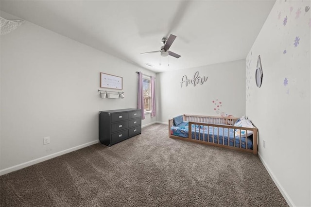 372 Garnet Dr, Acworth, GA 30101 - bedroom with carpet floors, baseboards, and ceiling fan