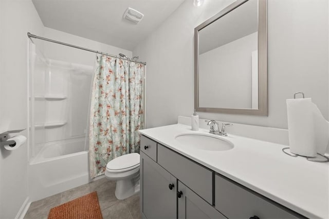 372 Garnet Dr, Acworth, GA 30101 - bathroom featuring vanity, toilet, shower / bathtub combination with curtain, and tile patterned floors