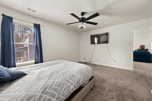 372 Garnet Dr, Acworth, GA 30101 - carpeted bedroom with baseboards and a ceiling fan