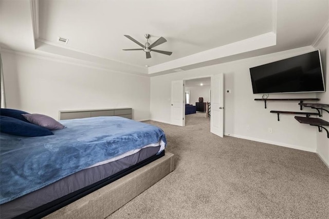 372 Garnet Dr, Acworth, GA 30101 - bedroom featuring a tray ceiling, ornamental molding, carpet floors, baseboards, and ceiling fan