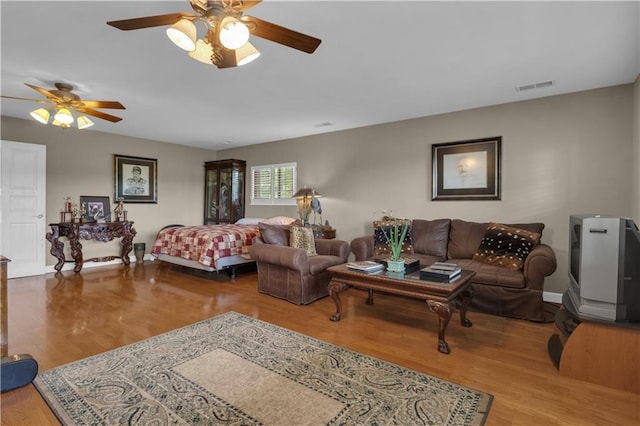 14501 Woolsey Rd, Hampton, GA 30228 - living area with a ceiling fan and wood finished floors