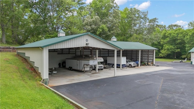 14501 Woolsey Rd, Hampton, GA 30228 - view of outbuilding featuring a carport