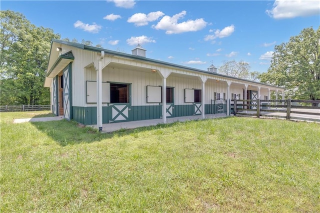 14501 Woolsey Rd, Hampton, GA 30228 - view of front of house with an exterior structure and an outdoor structure
