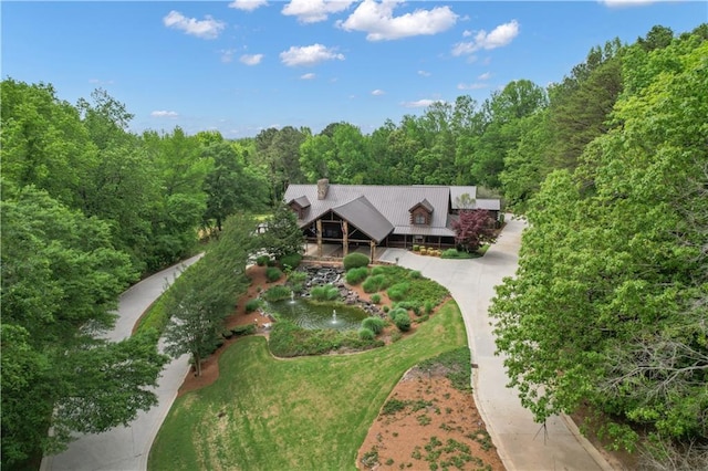 14501 Woolsey Rd, Hampton, GA 30228 - aerial view of property and surrounding area with a heavily wooded area