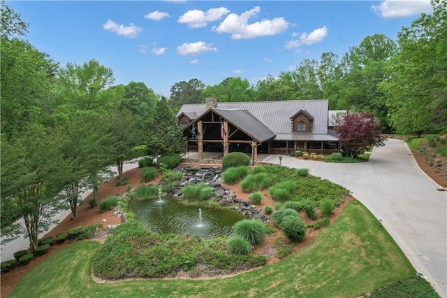 14501 Woolsey Rd, Hampton, GA 30228 - view of home's community featuring a small pond