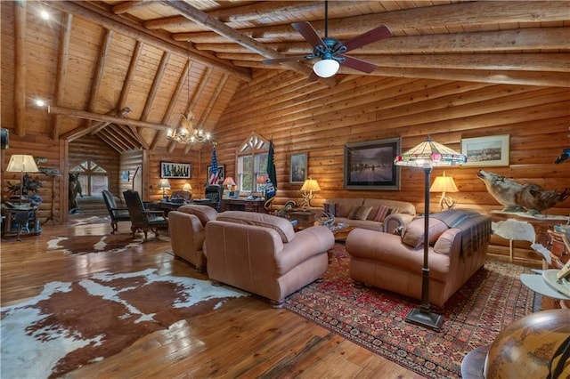 14501 Woolsey Rd, Hampton, GA 30228 - living area with high vaulted ceiling, a wooden ceiling with exposed beams, hardwood / wood-style floors, rustic walls, and a chandelier