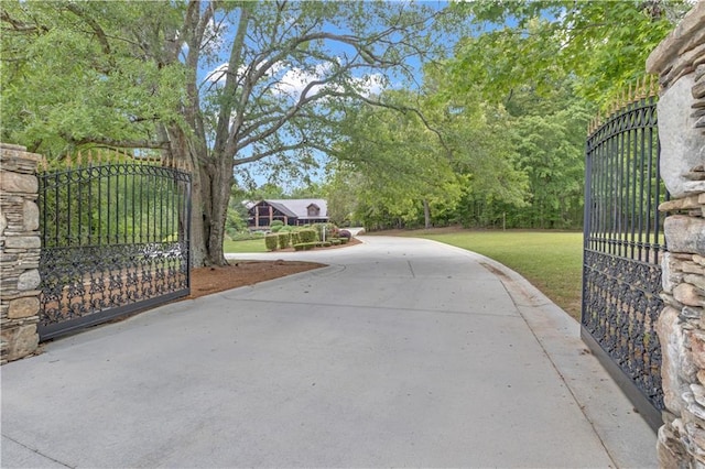 14501 Woolsey Rd, Hampton, GA 30228 - gate with a yard
