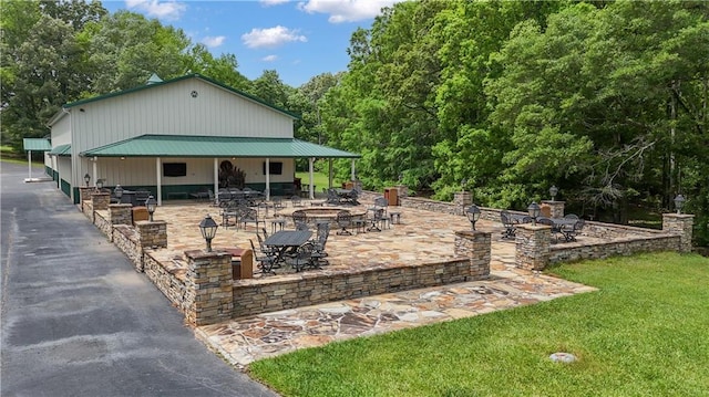 14501 Woolsey Rd, Hampton, GA 30228 - view of property's community featuring a fire pit, a patio area, and a yard