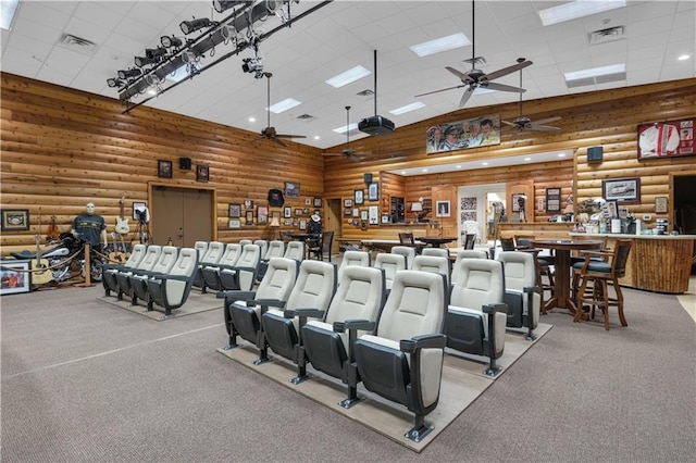 14501 Woolsey Rd, Hampton, GA 30228 - cinema with ceiling fan, rustic walls, and carpet flooring