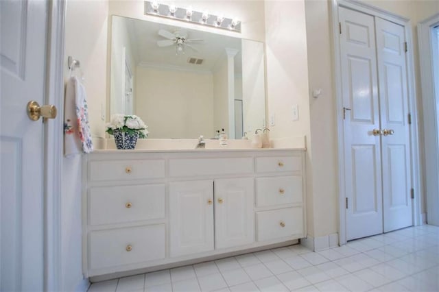 bathroom with a ceiling fan, crown molding, and vanity