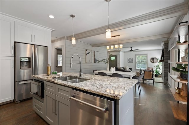 103 Willow Wood Cir SE, Atlanta, GA 30317 - kitchen with stainless steel appliances, a sink, crown molding, a kitchen island with sink, and ceiling fan