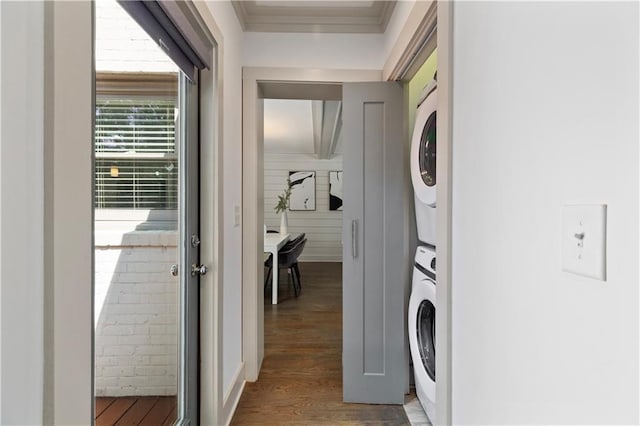 103 Willow Wood Cir SE, Atlanta, GA 30317 - laundry area with stacked washer and clothes dryer, wood finished floors, and ornamental molding