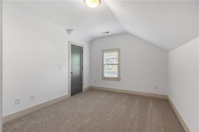 103 Willow Wood Cir SE, Atlanta, GA 30317 - additional living space featuring light colored carpet and vaulted ceiling