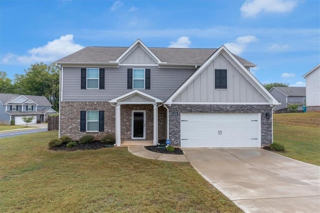 view of front of house with an attached garage, brick siding, driveway, a front lawn, and board and batten siding