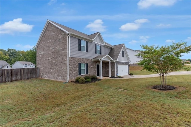 traditional-style house featuring brick siding, fence, concrete driveway, and a front yard