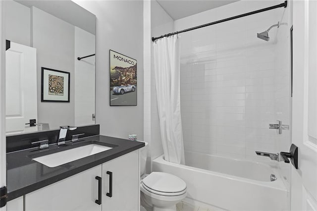 full bathroom featuring toilet, vanity, and shower / bathtub combination with curtain