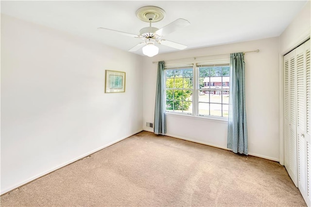 4581 Newcastle Cir, Lithonia, GA 30038 - unfurnished room with carpet and ceiling fan