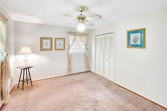 4581 Newcastle Cir, Lithonia, GA 30038 - unfurnished bedroom featuring carpet floors, a closet, and a ceiling fan