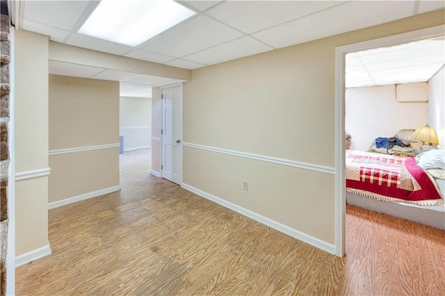 4581 Newcastle Cir, Lithonia, GA 30038 - empty room featuring a drop ceiling and wood finished floors