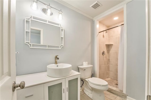 bathroom featuring vanity, crown molding, curtained shower, and toilet