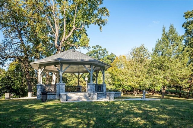 view of community featuring a yard and a gazebo