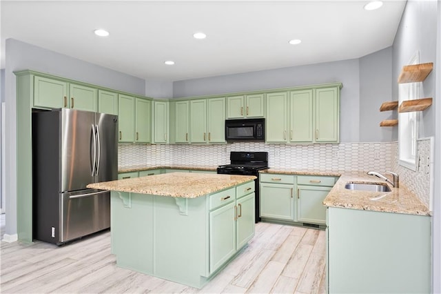 2595 Glaramara Ter, Cumming, GA 30041 - kitchen featuring black appliances, a sink, green cabinets, light stone countertops, and open shelves